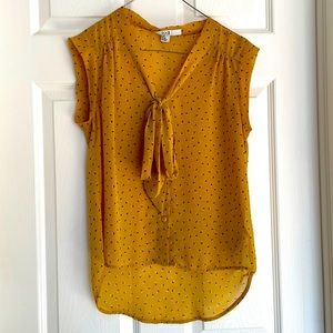 Silky sleeveless mustard blouse